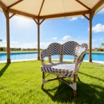 Parisian Style Natural Rattan Frame Armchair Fauteuils En Rotin with PE Synthetic Rattan Weave for Semi-Outdoor